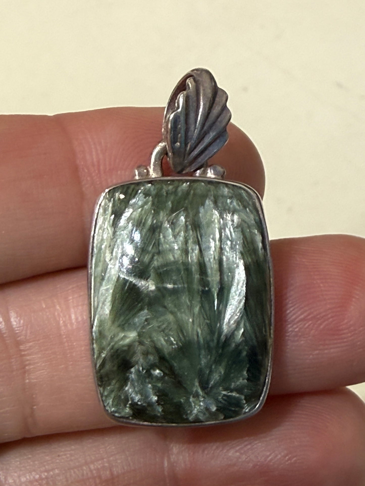 Seraphinite Pendant
Wings of Healing & Spiritual Light, 25mmx19mm Crystal Wellness