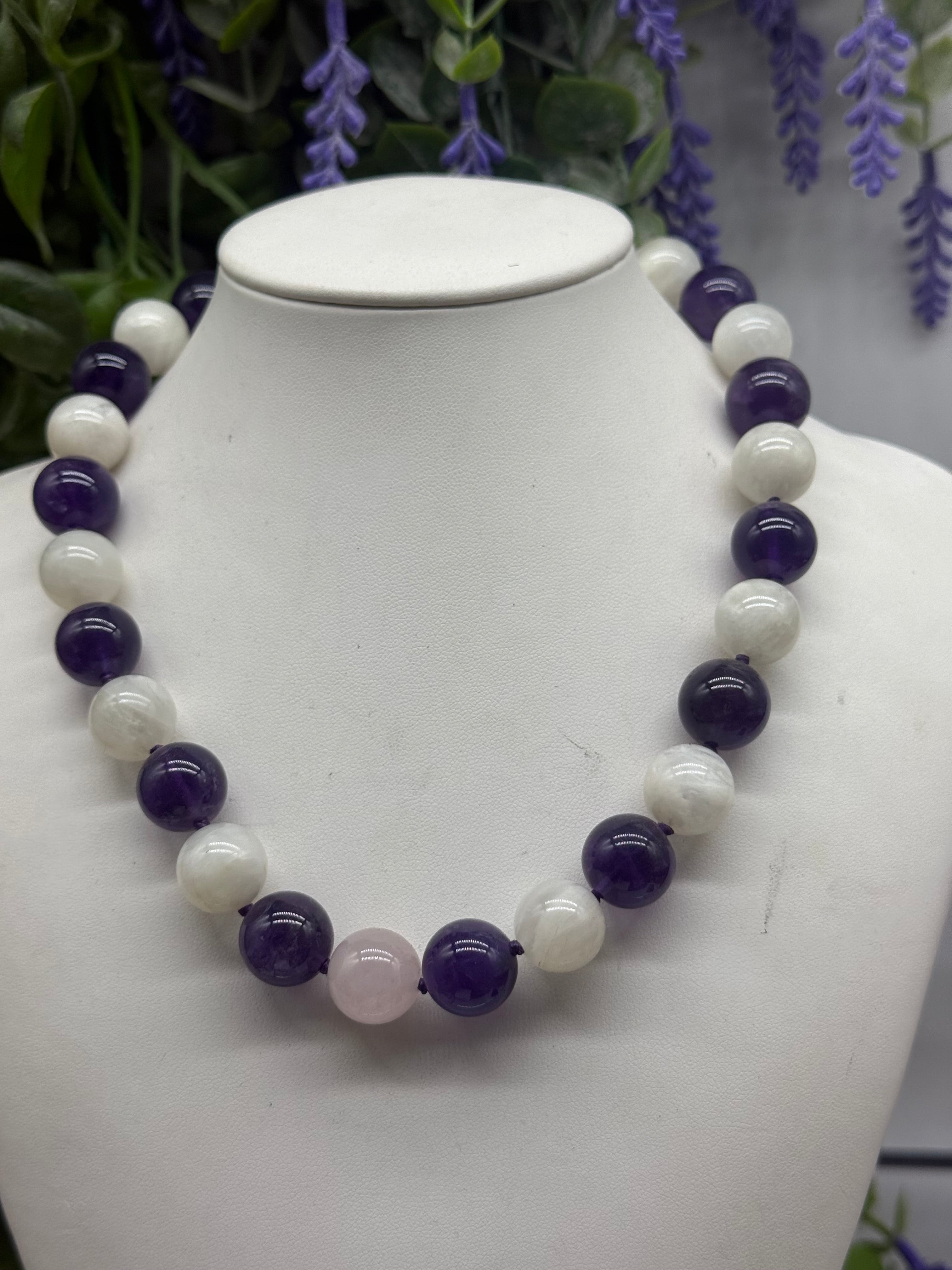 🌙✨ Triple Harmony Crystal Bead Necklace — Amethyst, Moonstone & Rose Quartz, 14mm

A necklace created for the heart, the soul and the intuition… 💜🌙🌸, 41cm Crystal Wellness