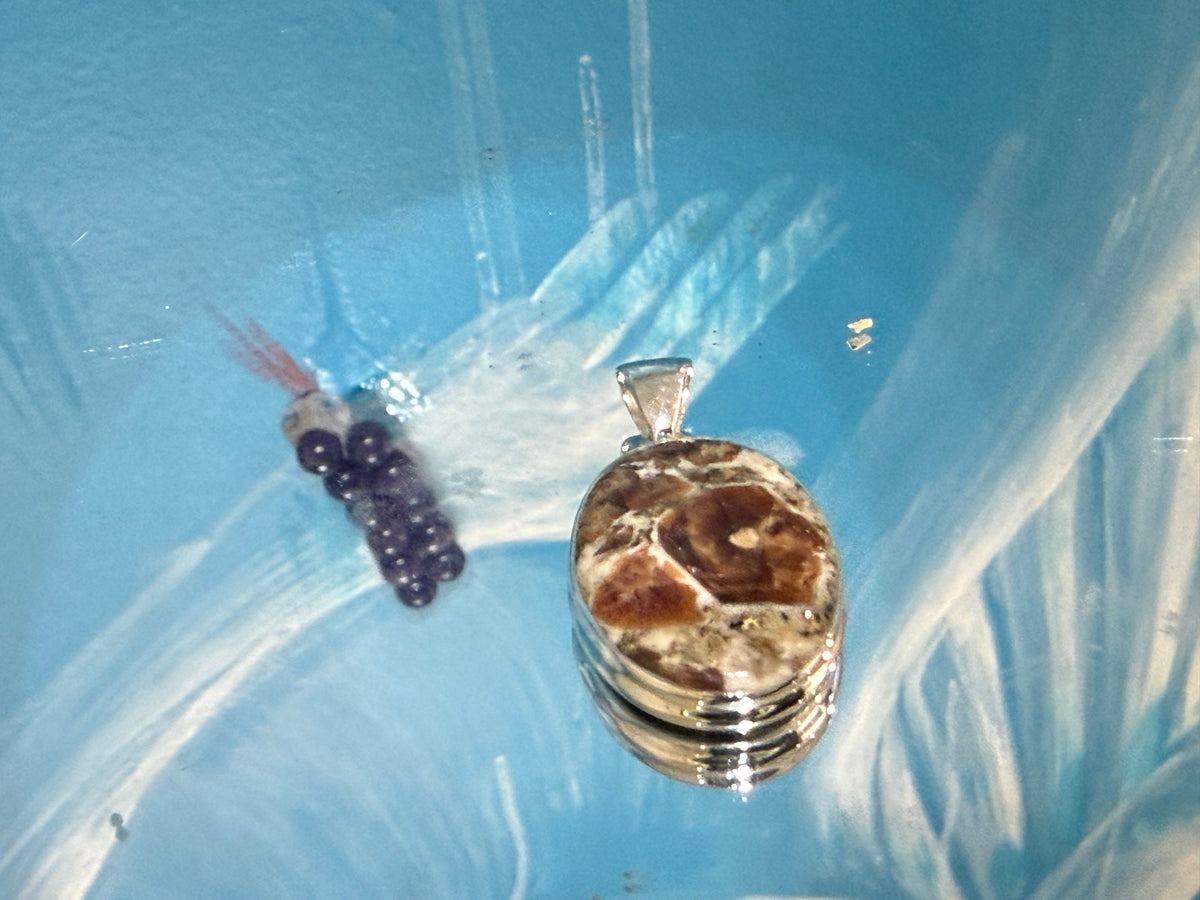 SPESSARTINE GARNET IN LIMESTONE SILVER PENDANT
“Stone of Passion, Creativity & Abundance”, 27mmx19mm Crystal Wellness