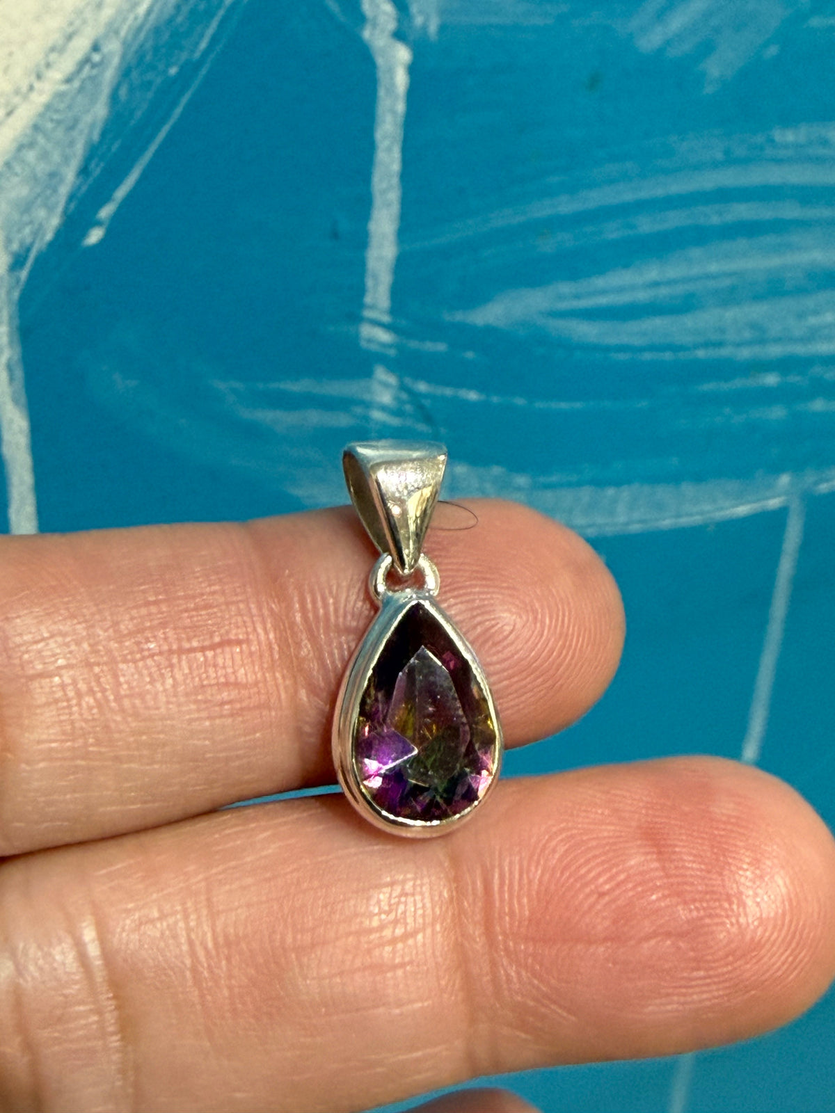 Mystic Topaz Pendant — Rainbow Light & Transformation

A luminous crystal of transformation, intuition and radiant energy. 14mmx10mm Crystal Wellness