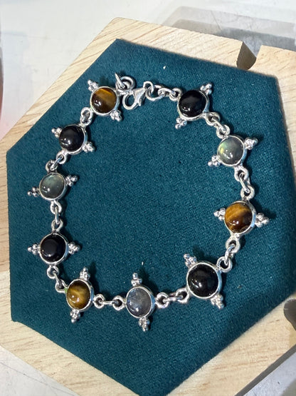 Black Onyx, Labradorite & Golden Tiger Eye Silver Bracelet, 29cm

Ground • Protect • Awaken Your Inner Power Crystal Wellness