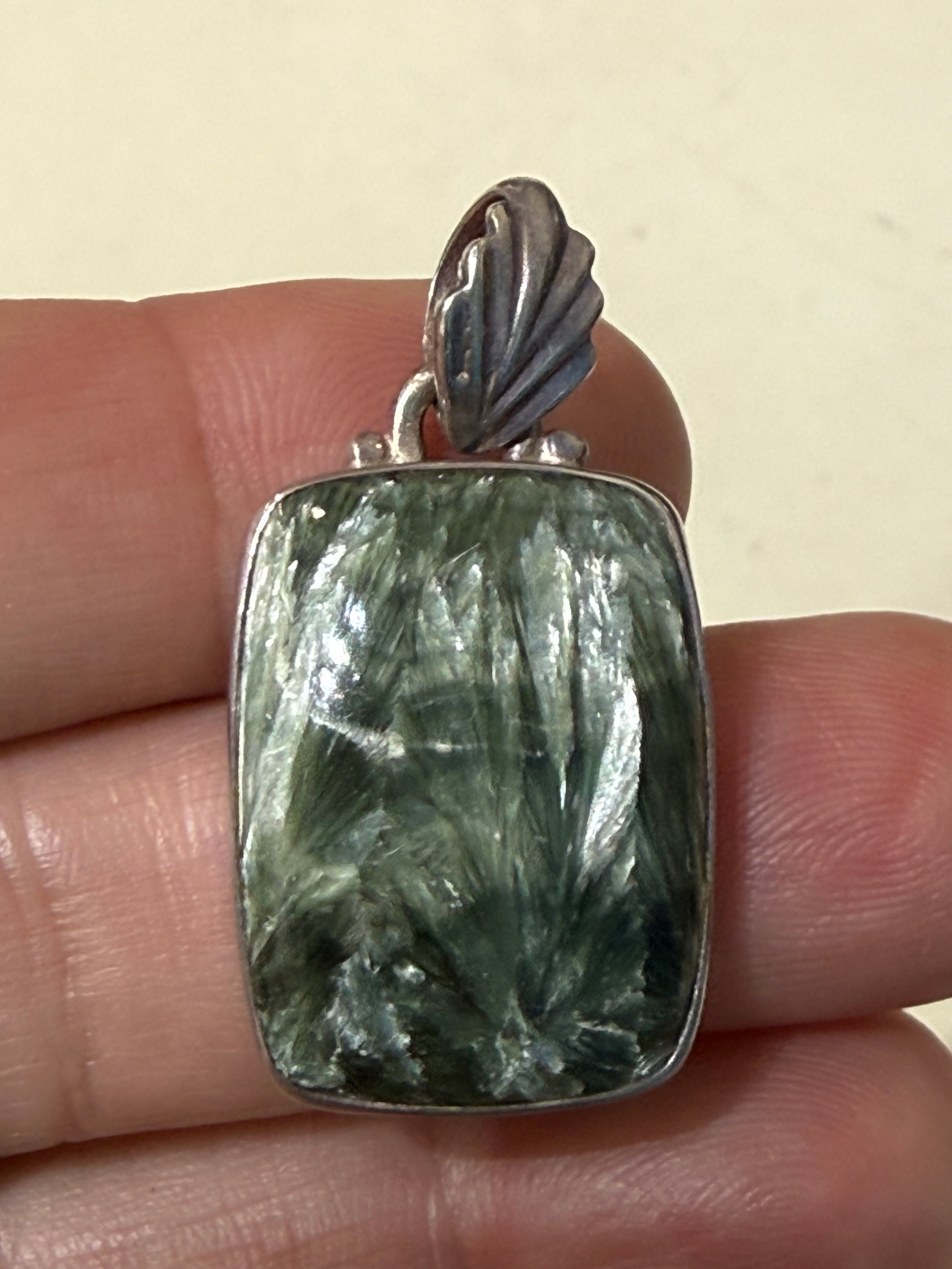 Seraphinite Pendant
Wings of Healing & Spiritual Light, 25mmx19mm Crystal Wellness
