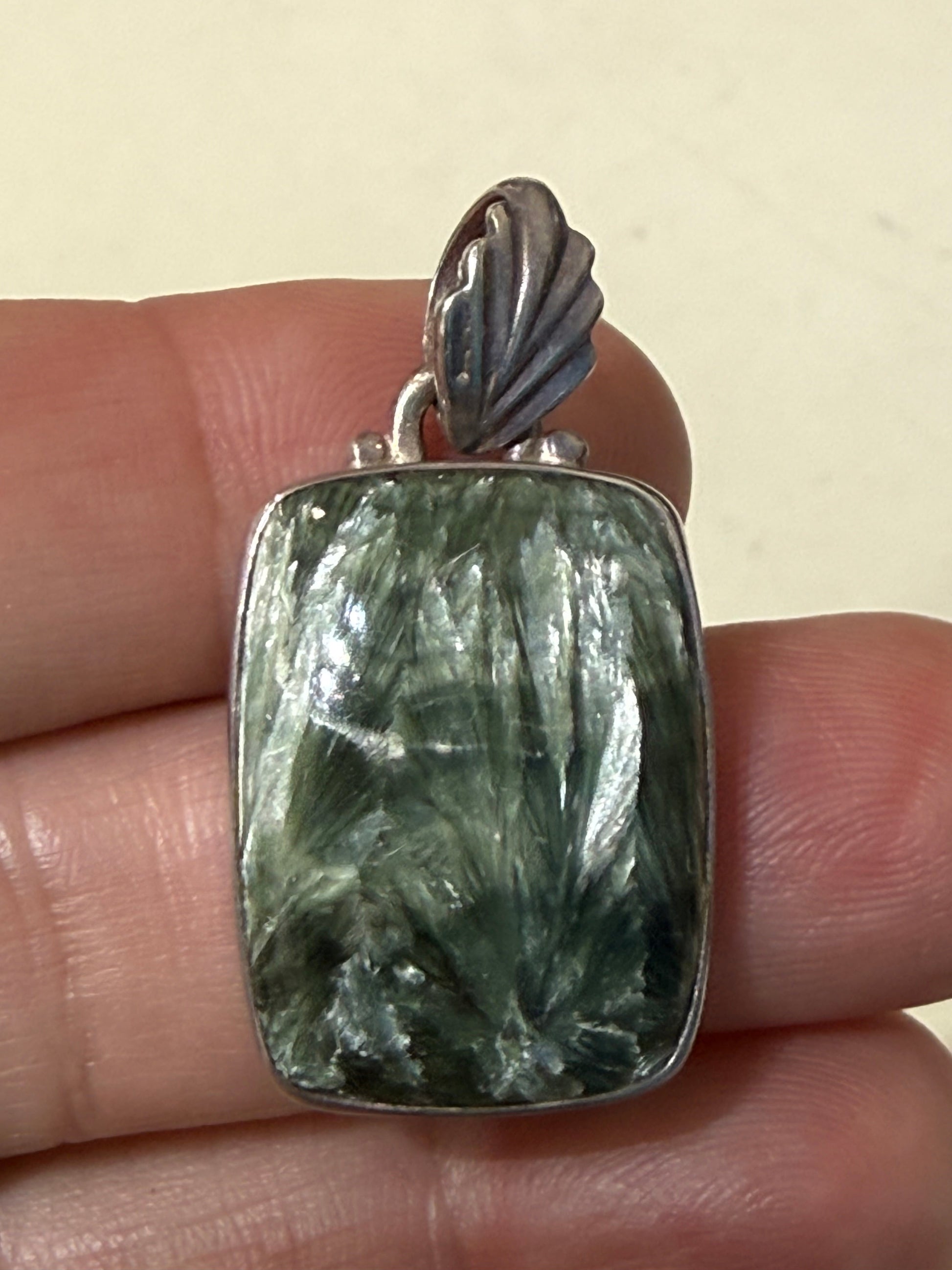 Seraphinite Pendant
Wings of Healing & Spiritual Light, 25mmx19mm Crystal Wellness