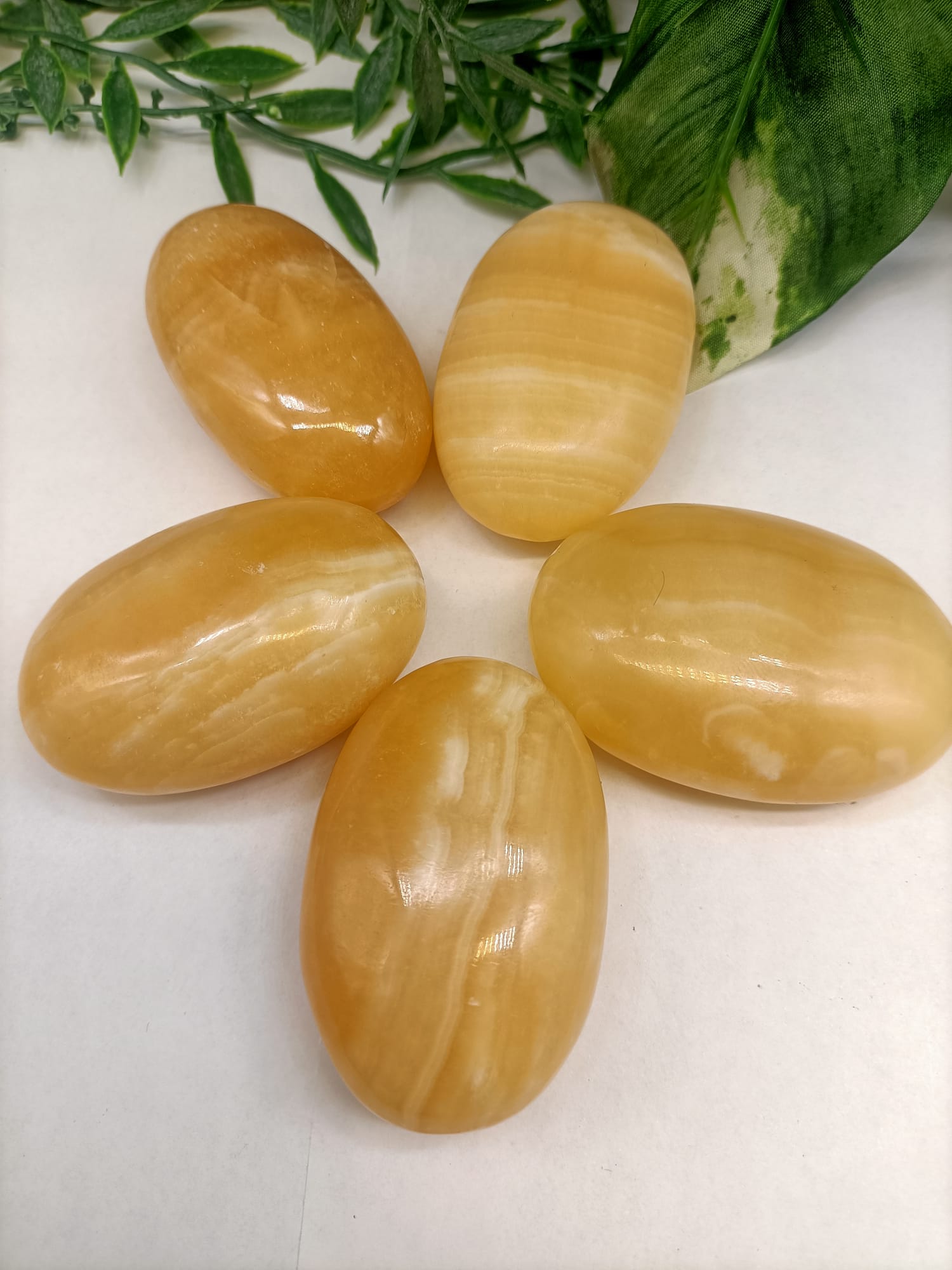 Orange Calcite Palm Stone Crystal Wellness