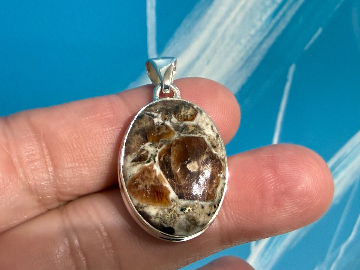 SPESSARTINE GARNET IN LIMESTONE SILVER PENDANT
“Stone of Passion, Creativity & Abundance”, 27mmx19mm Crystal Wellness