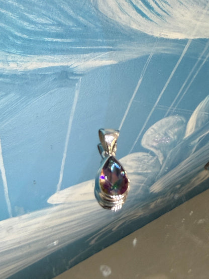 Mystic Topaz Pendant — Rainbow Light & Transformation

A luminous crystal of transformation, intuition and radiant energy. 14mmx10mm Crystal Wellness