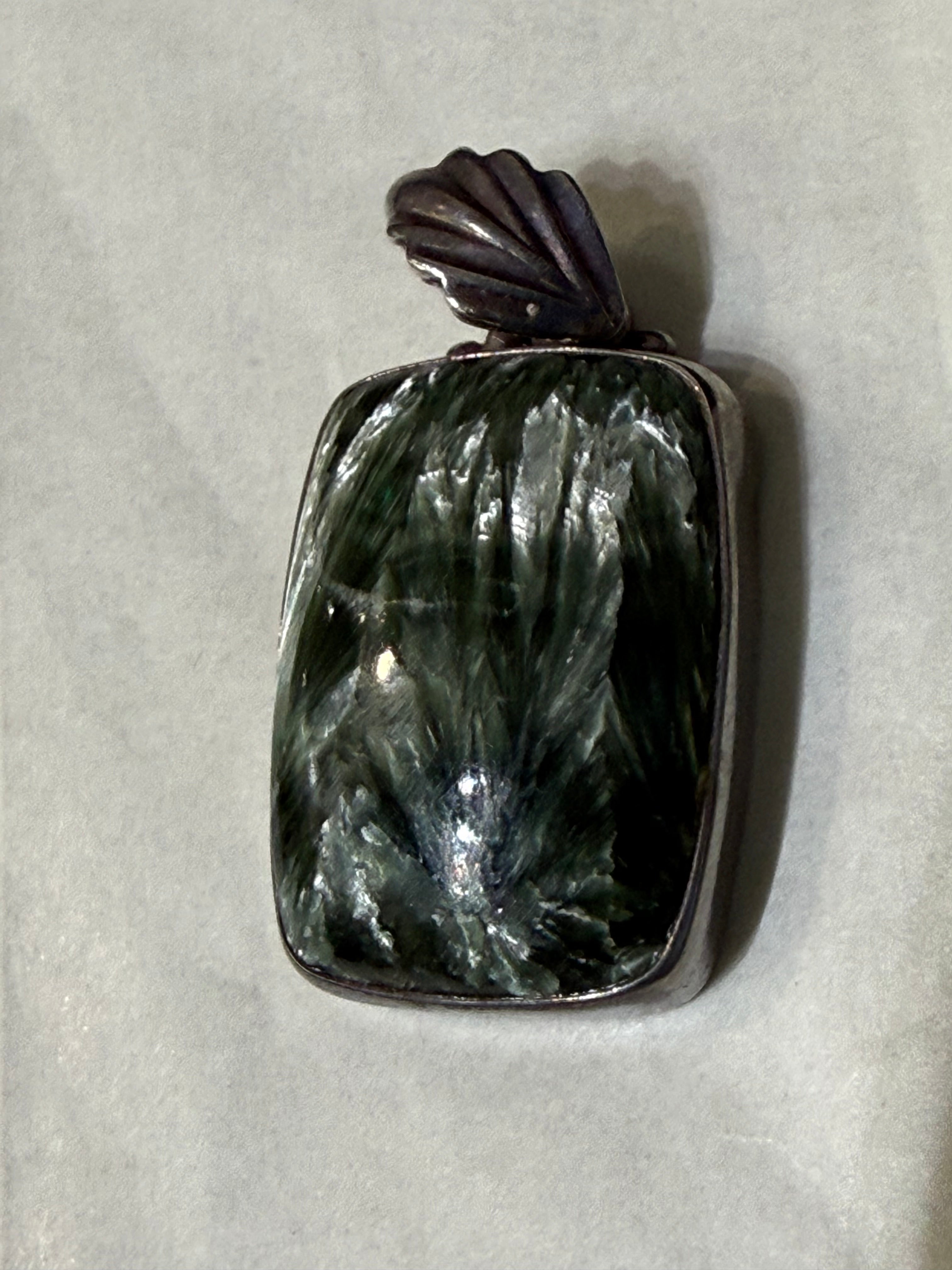 Seraphinite Pendant
Wings of Healing & Spiritual Light, 25mmx19mm Crystal Wellness