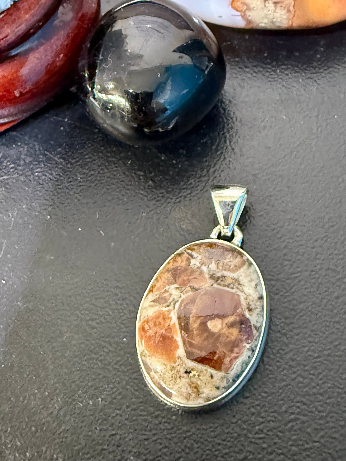 SPESSARTINE GARNET IN LIMESTONE SILVER PENDANT
“Stone of Passion, Creativity & Abundance”, 27mmx19mm Crystal Wellness