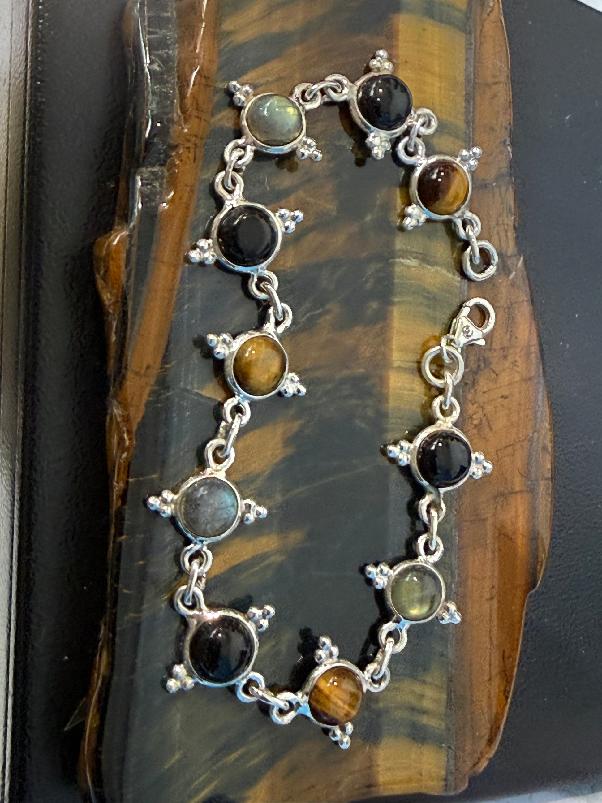 Black Onyx, Labradorite & Golden Tiger Eye Silver Bracelet, 29cm

Ground • Protect • Awaken Your Inner Power Crystal Wellness