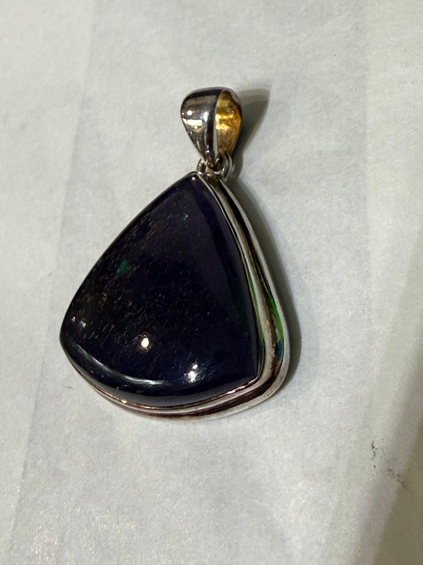 Sunstone in Iolite pendant Crystal Wellness