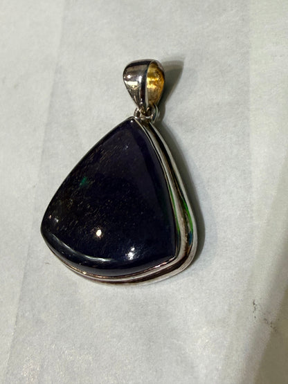 Sunstone in Iolite pendant Crystal Wellness