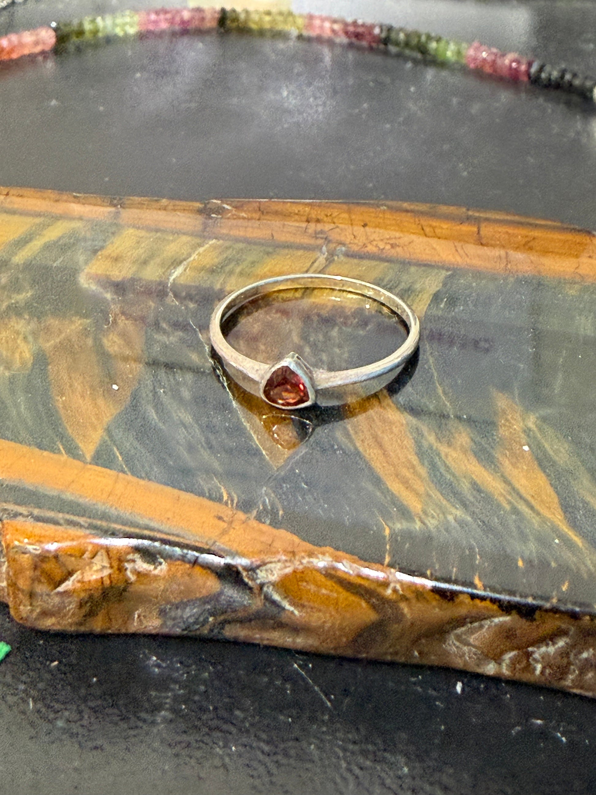 Garnet Silver Ring — Stone of Passion & Vitality, size 7

A captivating symbol of strength, passion and grounded confidence. Crystal Wellness