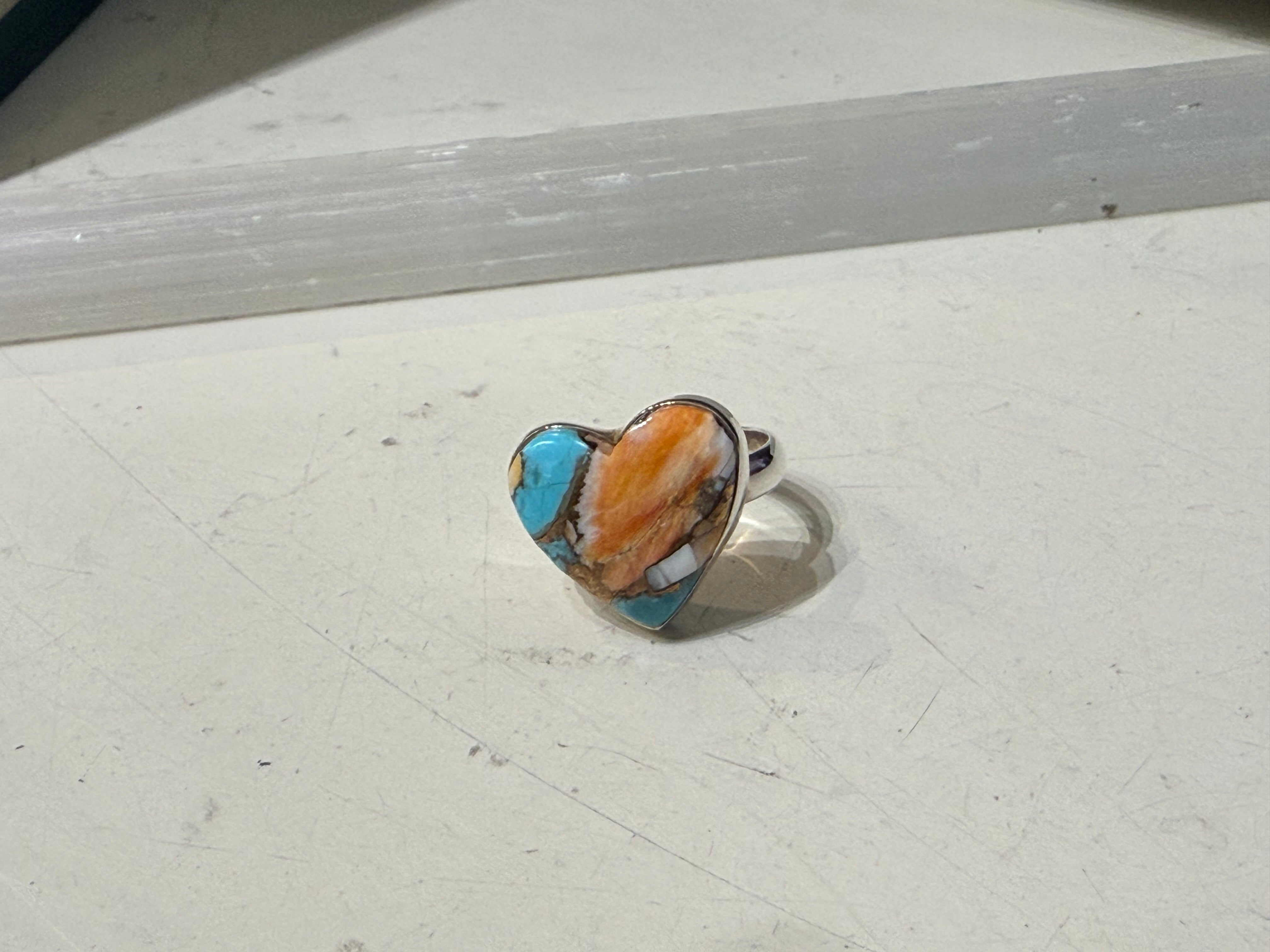 Spiny Oyster Turquoise Ring
Earth’s fiery spirit meets the wisdom of the sky — a ring of courage, truth, and soulful protection. Size 7.5 Crystal Wellness