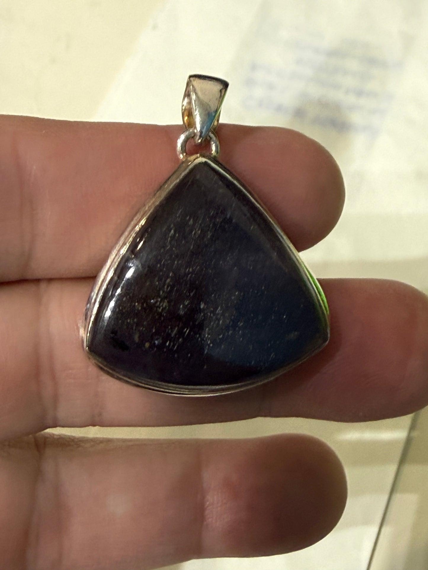 Sunstone in Iolite pendant Crystal Wellness