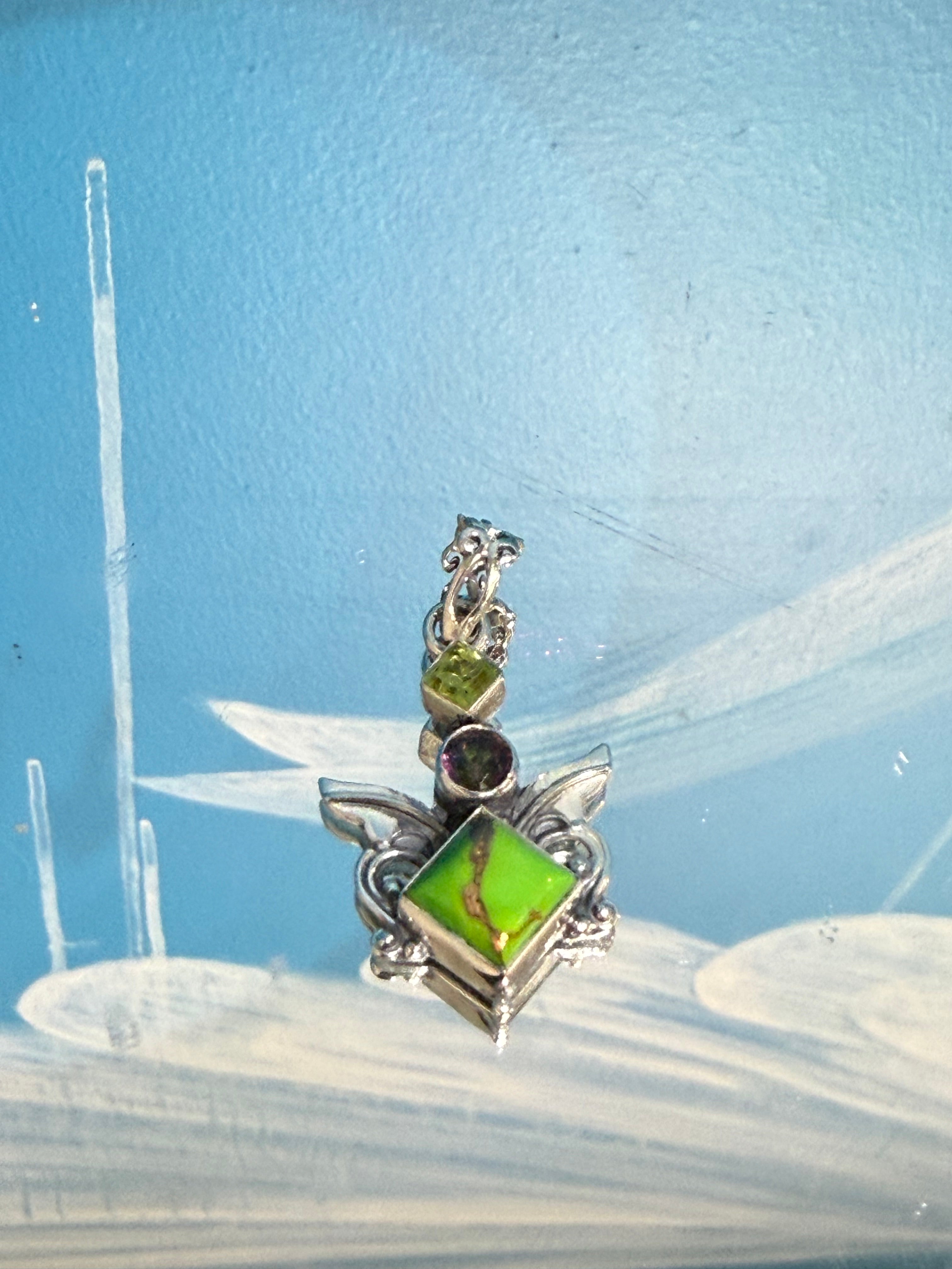 💚 Green Turquoise, Peridot & Mystic Topaz Pendant — Heart, Renewal & Transformation

A powerful harmony of Earth energy, renewal and rainbow light. 31mmx21mm Crystal Wellness