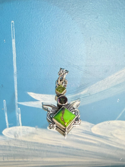 💚 Green Turquoise, Peridot & Mystic Topaz Pendant — Heart, Renewal & Transformation

A powerful harmony of Earth energy, renewal and rainbow light. 31mmx21mm Crystal Wellness