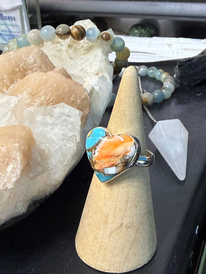 Spiny Oyster Turquoise Ring
Earth’s fiery spirit meets the wisdom of the sky — a ring of courage, truth, and soulful protection. Size 7.5
