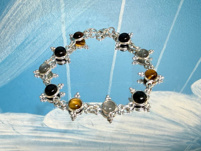 Black Onyx, Labradorite & Golden Tiger Eye Silver Bracelet, 29cm

Ground • Protect • Awaken Your Inner Power Crystal Wellness