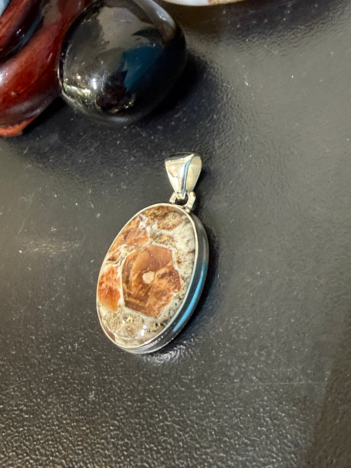 SPESSARTINE GARNET IN LIMESTONE SILVER PENDANT
“Stone of Passion, Creativity & Abundance”, 27mmx19mm Crystal Wellness
