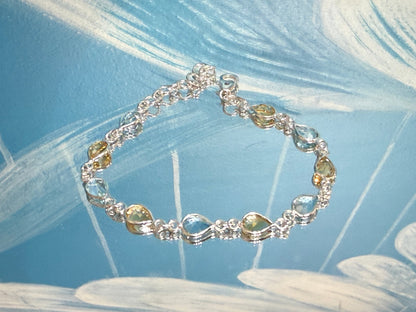 Citrine & Blue Topaz Silver Bracelet, 21cm

Abundance • Clarity • Joyful Expression Crystal Wellness