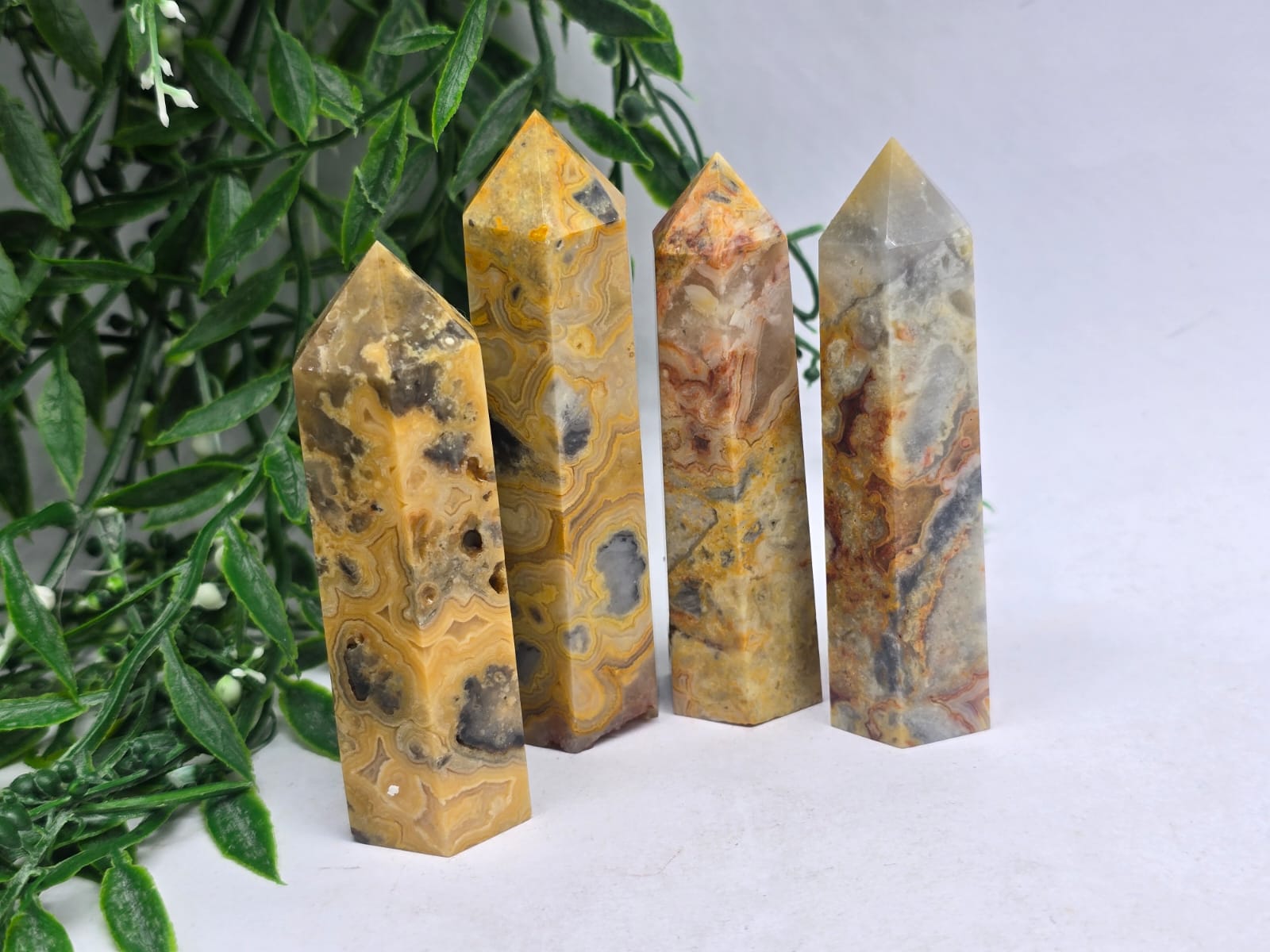 Crazy Lace Agate Point Crystal Wellness