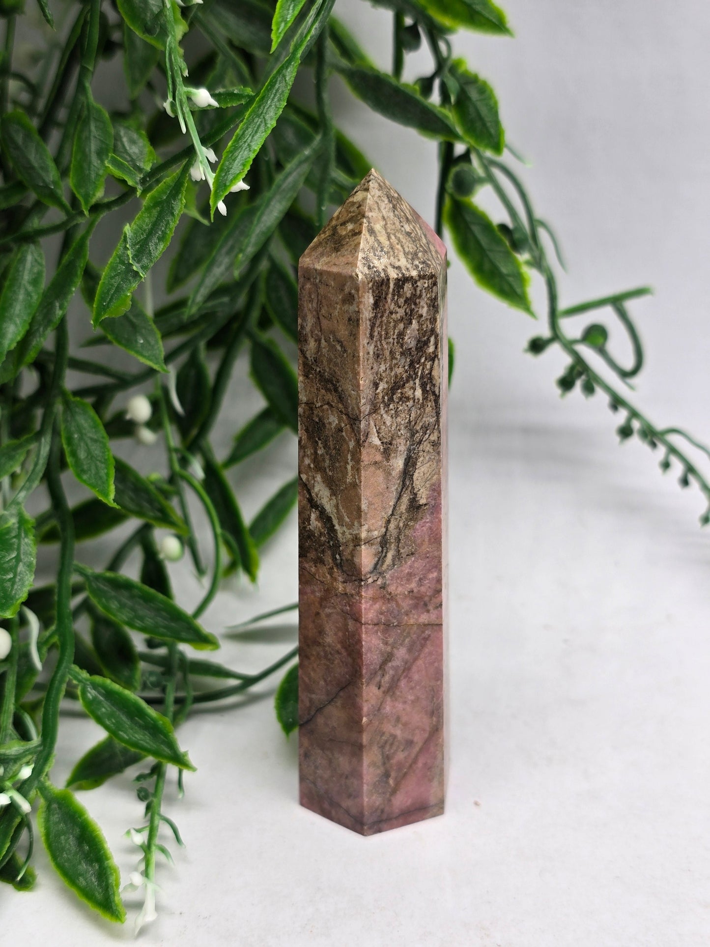 Rhodonite Generator Crystal Wellness