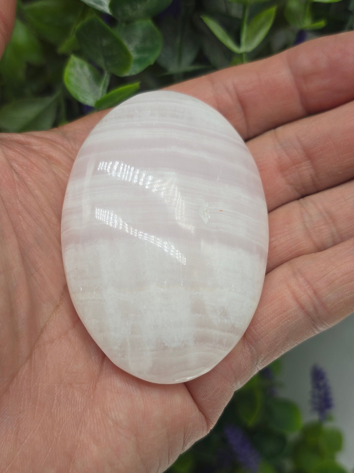 Mangano Calcite Palm Stone Crystal Wellness