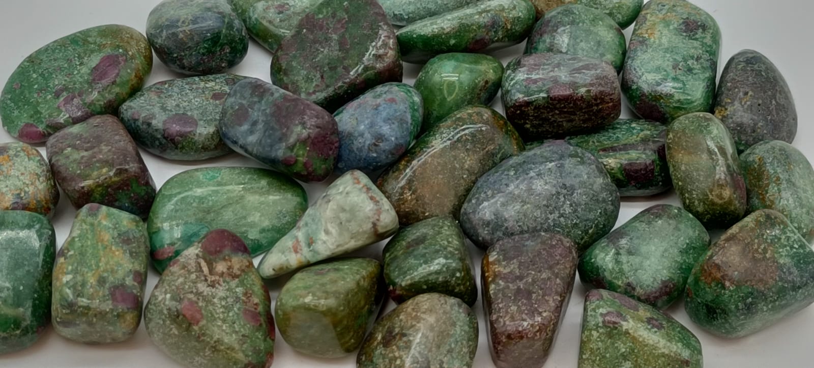 Green stone with pink spots clearance