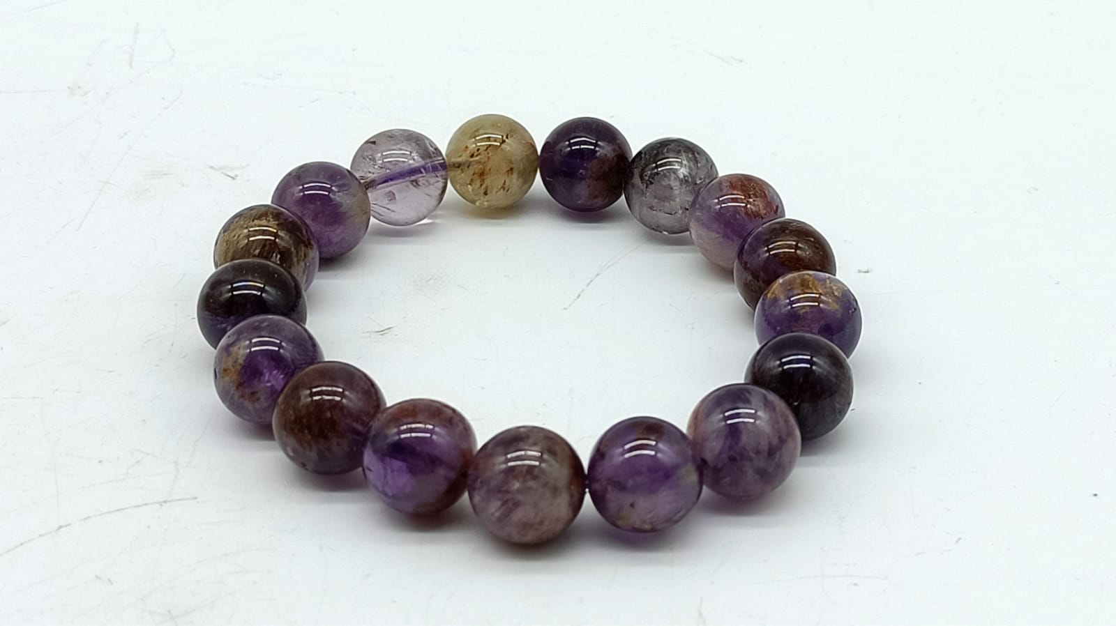Super Seven Cacoxenite Beads Bracelet 10mm